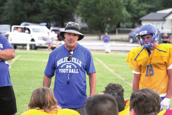 Holdenville defensive coordinator, Darin Johnson, address the Wolverines at the completion of Friday’s scrimmage. Coach Johnson went over the highs and lows of the teams inter-squad scrimmage.