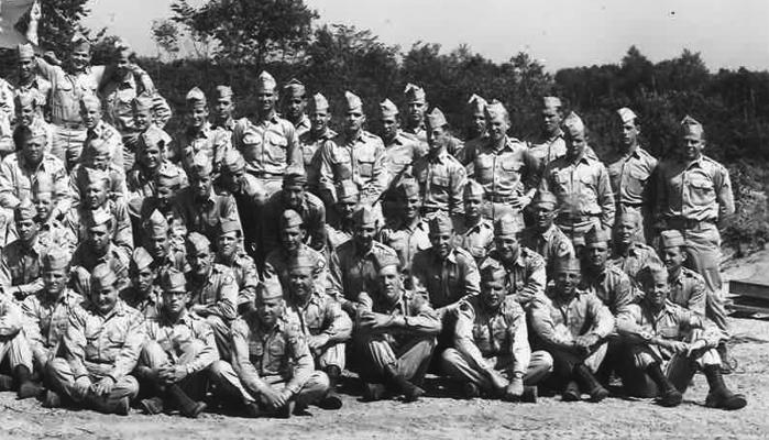 Brown, Bob Bennett. 2nd Row: ?, ?, Riddle, ?, Jack Smith, Cot Jones, Jim Hopkins, ?, ?, Derral Rider, Eddie Carlton, Jackie Dodson, ?, James Turpin, ?, Neil Hughes. 3rd Row: Bob “Lefty” Lee, ?, Leach, ?, ?, ?, Harold Reid, Newt Wall, ?, ?, Harold Bundy, Harold Christenberry, Carol Barton, Dick Pickens, ?. Top Row: Bill Lowder, Bill Coffman, ?, Kenneth Cornelius, ?, ?, Dewayne Keys, Charles Gordon, ?, Charles McRay, Tom Allen, Wayne Carlton, Elroy Tidmore, ?, Bill George, ?.