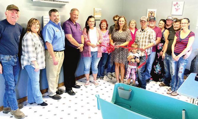 Ribbon Cutting held for Muddy Paws