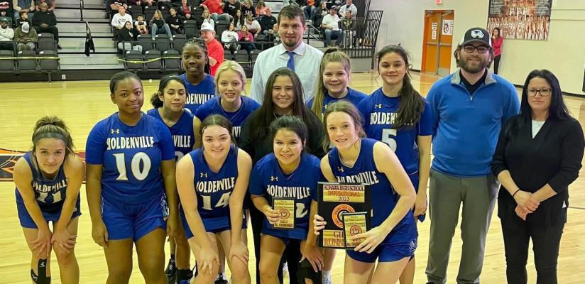 The Holdenville girls earned the runner-up trophy by finishing second in the Tiger Classic at Konawa. Pictured are: On the far left is Princess O’Neil #10 is Mylisha Allen behind her is Blakeli Whiteman next to her is Ally Inselman, coach Savannah Childress, Bella Smith, Brooklyn Nelms, coach Alan Hargis coach Leslie Phillips. The front row is Cylee Null, Ryleigh Hill and Mady McFarland. The very back row is coach Snow and Damyah Olden.