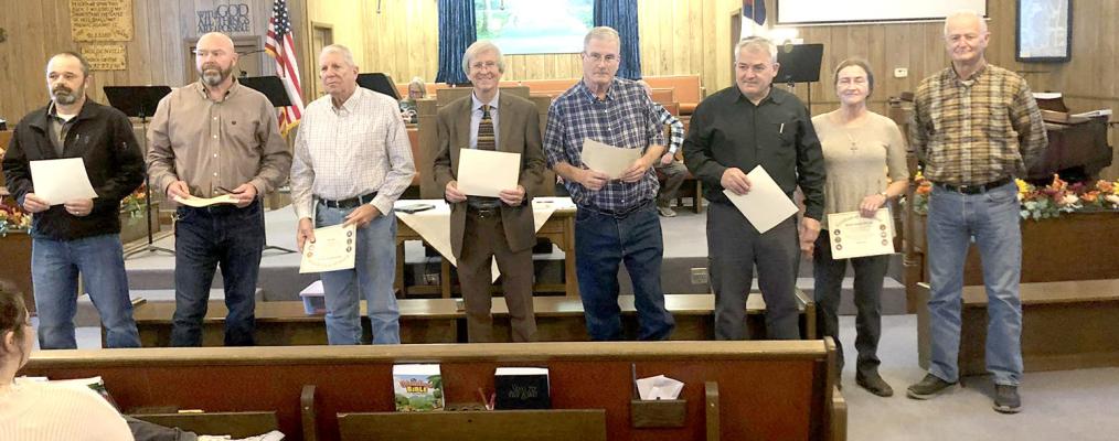 HOLDENVILLE NAZARENE CHURCH HONORS VETERANS ON SUNDAY... Churches all across Holdenville honored their veterans this past Sunday. Hughes County has an incredibly high number of veterans per capita compared to other cities. Pictured above are (L-R): Clifton Sneed, Steve Bryant, Denny Langdon, Bill Robinson, Arthur Cook, Bill Wilkinson, Julie Wilkinson, and Ed Schroyer.