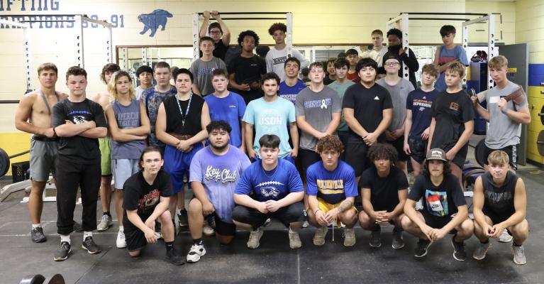 Wall of honor.....The Holdenville High School football team has been putting in the work this summer! The chart on the wall in the weight room is impressive and is on display to show the results of their hard work.