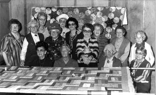 DAYS GONE BY... These local quilters spent many hours together quilting and lifting one another up. Pictured above are: Row 1: Lola Pannell, ?, Lois Alexander, Kathryn Sisney. Row 2: ?, Ila Hester,? Ruby Shed, Johnie Lawyer, Edith Mayhew, Syble Mathis. Back Row: Opal Salazaar, Pauline Moore, Mrs. Rusher.