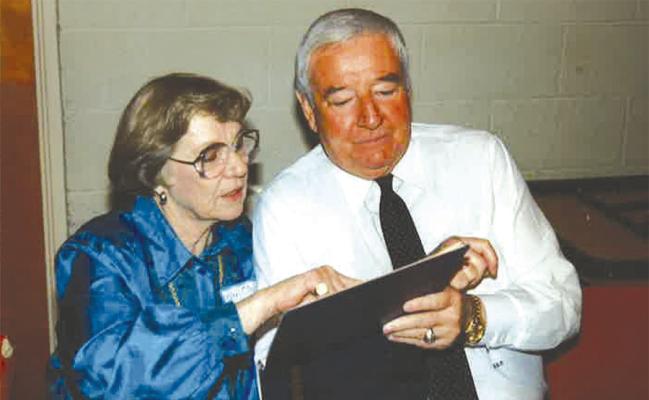 A TRUE AMERICAN HERO... George Cotton, pictured above in 1992 with his friend Peggy O’Neill Austin, was in the first wave of the invasion of Normandy. He was one of the few who survived.