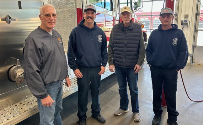 Larry Miller and Steve Enosdeliver a donation to the Holdenville Fire Dept. for the Toys for Tots program. They are pictured above with Holdenville Firemen, Jarrad Rogers and Colton Cox.