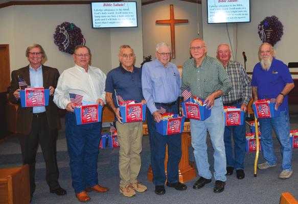 Faith Freewill Baptist Church honored their veterans in a special ceremony Sunday. Veterans pictured are: Bill Robinson, Jerry Young, Leroy Dority, Jim Keefer, J.C. Kanard, Dub Tatum, Larry Hamilton. A special thank you to Psator Earl Scroggins and members of the church for the gift bags they presented to each veteran and for the beautiful Veteran Day decorations placed throughout the church.