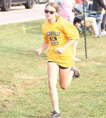 Madyson Richmond won a medal in the Holdenville cross country race last weekend. Madyson ran her race in 9 minutes flat.