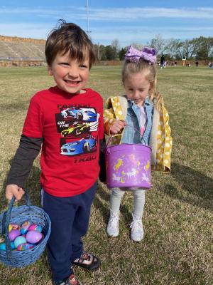 Rolland McMahan and Destin Tucker had so much fun hunting eggs with other Reed Elementary students last week at Wolverine Stadium.