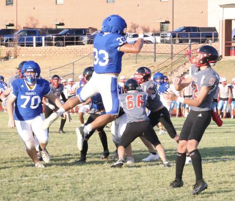The Wolverine defense was flying around the field making plays in the scrimmage at Luther.