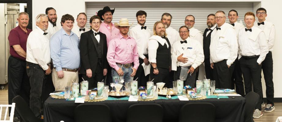 AT YOUR SERVICE! The waitstaff for the evening of elegance were hand selected from right here in Holdenville and received extensive training to provide top quality service while looking exceptionally handsome. Pictured above are: Joe Hayden, Berry Wood, Andy Baca, Cody Slater, Blayne Norman, Nathan Henager, Jeremy Beck, Matt Peters, Dmitry Samokhvalov, Jeff Whitesell, Waylon Ford, Joe Durbin, Cameron Miller, Johnny Babb, Stephen Stewart, Slade Honsinger, Taylor Laxon, Easton Guest