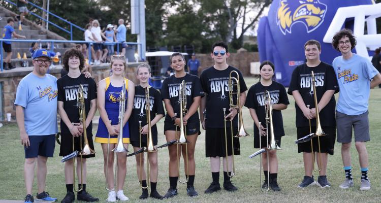 The Golden Pride trombone section gave an impressive performance during the playing of the National Anthem prior to Holdenville’s football game with North Rock Creek. Pictured are: Mr. Crosby, John Richmond, Scarlett Irby, Caily Eller, KylieRae Leftwich, Aiden Ayers, Izzy Barrientes, Brayden Kelley, Mr. White.