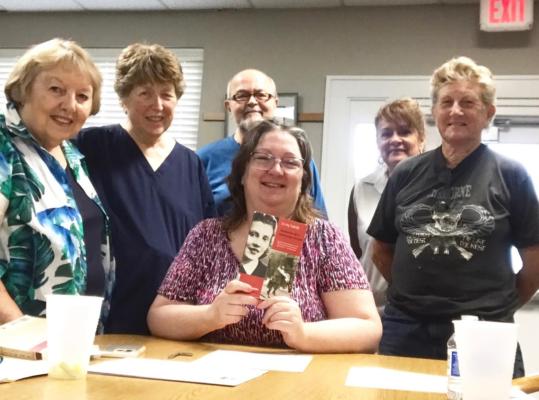 Pageturners initial membership includes: (Seated) Grace M. Pickens Librarian Kim McNaughton; (Standing, Left to Right) retired HHS English instructor Randa Phillips, the Reverend Kathy Radach, Byron L. Tapley, Episcopal Deacon Cyntha Gilks-Ayers, and Jean Larimore.