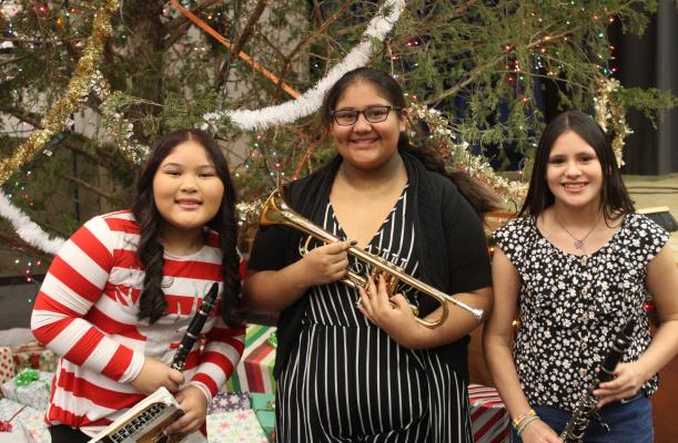 A CHRISTMAS CONCERT TO REMEMBER... Paizley Nunnally, Allianna Casio-Harris, and Hailee MCulley were three of the bright and shining stars at this year’s middle school band concert.