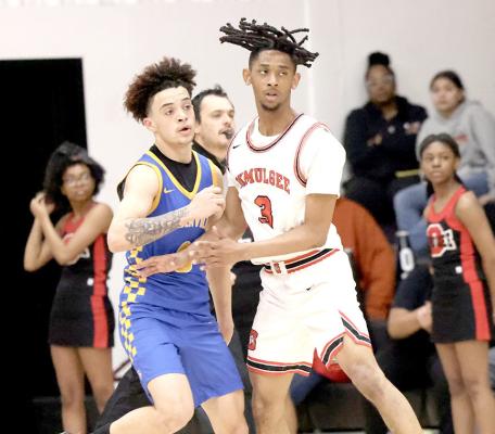 Sometimes Holdenville’s Kase Sipes moves so fast he can make a defender’s dreadlocks twirl. Sipes made a quick move and Okmulgee’s Javin Hutchison’s dreadlocks just couldn’t keep up.