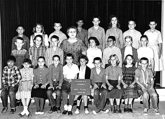 Legend: Fifth Grade, Diamond School, 1959-1960. — Front row: Lewis Moppin, Annette Adamson, Linda Massad, Steven Pray, Donna Decker, Lana Osburn, Terry Troup, June Wilson, Linda Albertson, Jimmy Roberts. Second Row: John Majors, Susan Stirman, Larry Smith, Mrs. Tilley (teacher), Karen Smith, Sandy Powell, Patti Powell, Jane Stafford. Top Row: David Proctor, Deborah Haley, Junior Seeley, Joan Fife, Chuck Amos, Kathy Nease, Larry Adams, Arlene Langdon.