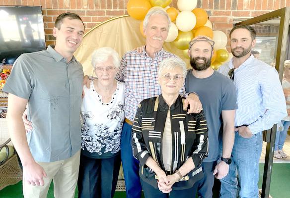 END OF AN ERA... Chuck Simmons retires as administrator of Heritage Village Nursing Center. Chuck has been a beloved part of the nursing home for forty years. We wish him the very best in his retirement. Chuck is pictured above with his family: Son, Nick, Mother Mae, wife Donna, Son Lucas, and Son Kyle.