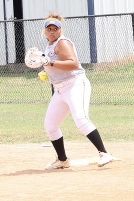 Holdenville first baseman, Autumn Jackson, prepares to throw a runner out at home during a pre-season drill. The Wolverines will open the season at Lexington on August12th.
