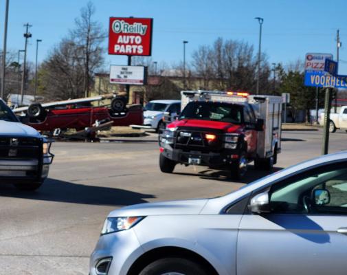 TRUCK WRECKS INTO POLE AND FLIPS OVER KNOCKING OUT POWER TO SEVERAL BUSINESSES AND RESIDENTS