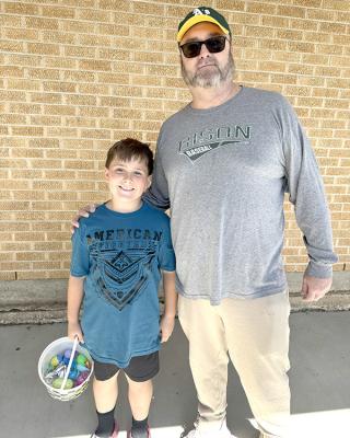 Jimbo Cox had a funfilled morning watching his son Luke hunt eggs for Easter at Reed Elementary.