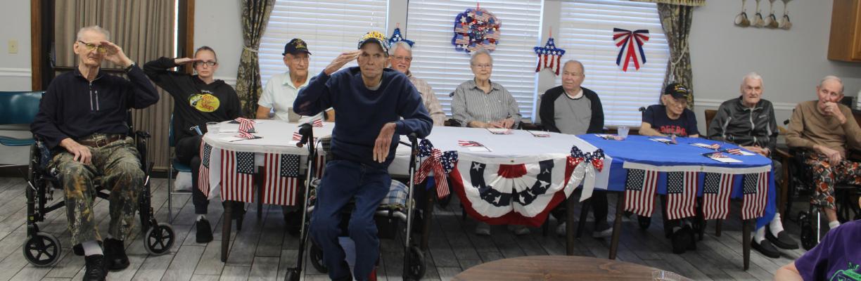 VETERANS WERE HONORED THIS PAST WEEK WERE HONORED AT HERITAGE VILLAGE. Pictured above are James Cook, Anna Valdon, Leroy dority, Bruce Foster, Mary Marrs, Hardy Wingo, Johnny Jayu, Bill Horne, Bob Simmons, and Marvin Tampleton.