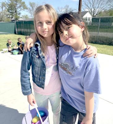 Best Buds...Penny and Esme had fun hunting eggs with Ms. Brown’s class and the rest of Reed Elementary this year for Easter.