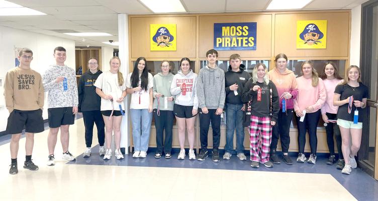 UNDER THE GUIDANCE OF MR. ORSBURN, MOSS JUNIOR HIGH AND HIGH SCHOOL HELD A SCIENCE FAIR.