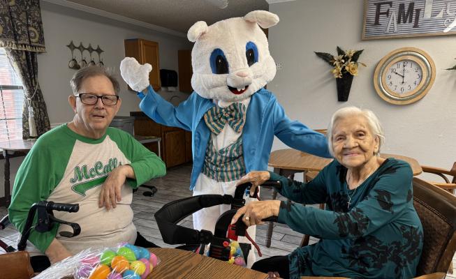 JP STIVERSON AND DOROTHY BURDEN WERE SO EXCITED to get a visit from the Easter Bunny (Beth Ann Robinson) at Heritage Village this year. JP and Dorothy are two of Hertiage’s favorite residents.
