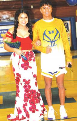 HHS Basketball freshmen attendant, Ryleigh Tiger and her escort, Izaia King.