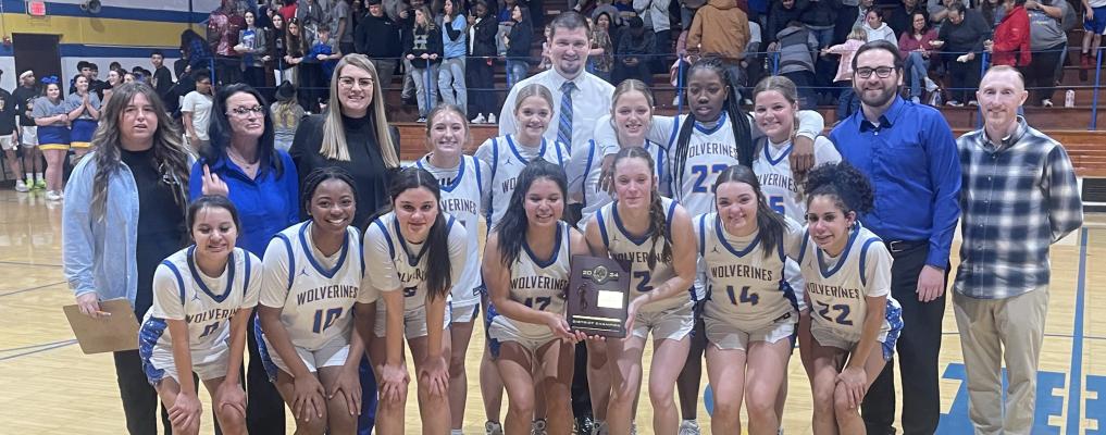 HOLDENVILLE BOYS, GIRLS CLAIM DISTRICT TITLES