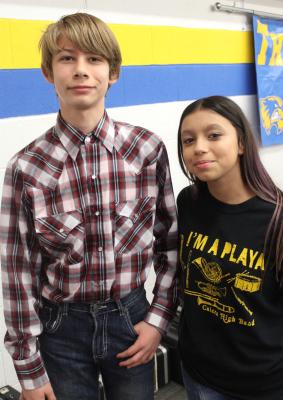 ELI ROBINSON AND ANNALISE STILES were in the band room just a few minutes before the Christmas concert getting their instruments. They both gave an incredible performance!