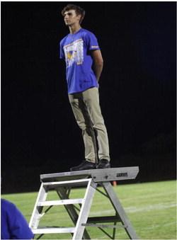 2414 - Mason Carpitcher is the Drum Major for the Holdenville Golden Pride. The band displayed their 2022 show when they marched at half-time of the Holdenville vs Wewoka football game.