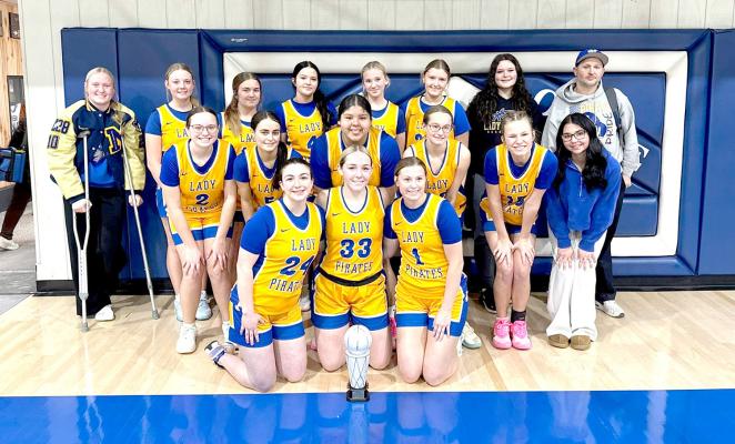 THE MOSS LADY PIRATES WON THIRD IN THE BOWLEGS BASKETBALL TOURNAMENT. Pictured above (back row): Graycee Janes, Graclee Huff, Kinzlie Barbre, Kayla Priest, Kate Rogers, Faith Yarbrough, Josslynn Rollins, Head Coach Michael Freeman; Middle row: Sloane Van Haren, Tara Keesee, Leah Harjochee, Paycee Van Haren, Landri Mills, Bryleigh Jordan; Front row: Kara Mayfield, Elexis Stafford, Reese Harris