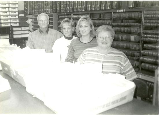 PICTURE FROM THE PAST... Hughes County Treasurer Bobby Smith is pictured with his staff, Dawn Lindsey (who is our current Treasurer), Brenda Welch and Judy Dunkleberger.