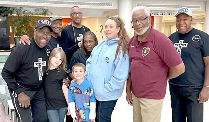 Recently, the Shiloh Baptist COGIC of Holdenville, along with the Wildwood Baptist Church of Oklahoma City came together to present a monetary gift to the family of Candace Harjo. Pictured are Pastor Richard Gaines, Deacon William Jones, Pastor Earl Bryant, Sister Karen Kirkendoll, Candace Harjo, Pastor Earl Crawford of Shiloh Baptist, and Deacon Robert Mayes. The children are Ellie and Jackson Harjo. If you would like to donate to this family, you may do so at First United Bank in Holdenville.