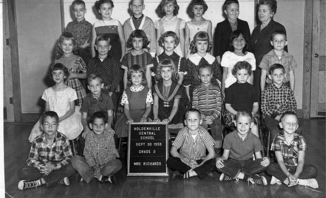 MRS. RICHARDS SECOND GRADE CLASS AT CENTRAL SCHOOL. Pictured above are Bottom Row (L-R): Tony Byerly, Robert Harrison, Ricky Burkes, and Tony Williams. Second Row: Steve Whitton, Christie Robinson, Karen Dallinger, Taylor Ramsey Cantre;ll, Kathy Kernek, and Frankie Dunca, Row Three: Kenneth Ray Young, Debbie Apple, Beverly Pettit, Debra English, and Barry Lynn Whaley. Top Row: Le McMorries, Shirley Paris, James Carl Oliphant, Harriett Darks, ?, Keith Hopkins, and Teacher Mrs. Luther Hillis.