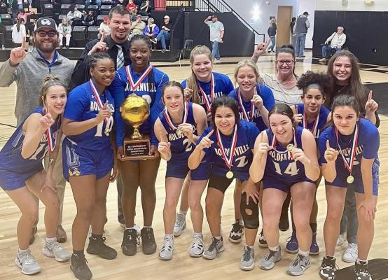 The Holdenville High School girl’s basketball team won the 66 Conference Tournament with a 56-41 win over Okemah in the Championship Finals. Pictured are Princess Oneill, Mylisha Allen, Dahmyan Olden, Madi McFarland, Bella Smith, Ryleigh Hill,Ally Inselman, Cylee Null, Blakeli Whiteman, Brooklyn Nelms. Coaches in the back are Allan Hargis, Dillion Snow, Leslie Phillips, Savanah Childress