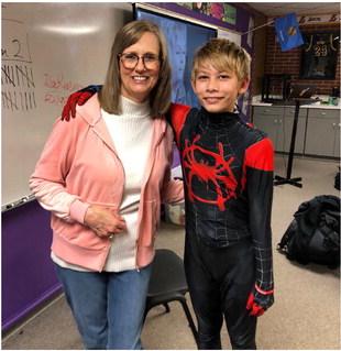 Spider-Man in a rare photo without his mask showing his true identity: Eli Robinson. We knew it! Eli is pictured with his Nana, Dayna Robinson.