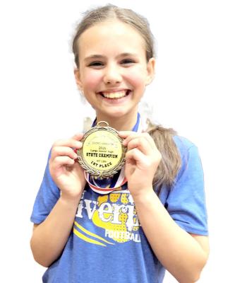 STATE CHAMPION: Holdenville sixth-grader Ruth Barker recently captured the Oklahoma Junior High State Championship in the 97-pound large school weight class, finishing first among nine competitors from across the state in grades 6–9. Barker recorded a 150-pound squat (personal record), 90-pound bench press and 190-pound deadlift, totaling a personal-best 430 pounds to claim the title. Ruth is the Daughter of David and Danielle Barker.