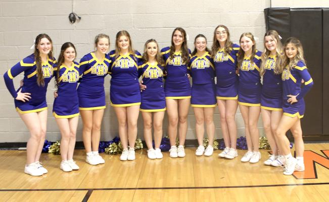 The Holdenville High School cheerleading squad was on hand to cheer the Wolverine boys and girls to their victories at Wewoka.The cheerleaders will be busy this week when the Wolverines travel to Konawa for the Tiger Classic. L-R: Lily Scroggins, Sara Coats, Ally Insleman, Audrey Miller, Makenzie Fowler, Makaylie Crawford, Natalie Jennings, Sierra Crawford, Peytyn Sneed, Tristin Goodman, Justice Morris
