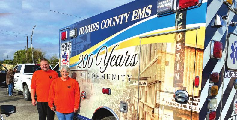 Chris Miller, Operations Supervisor at Hughes County EMS is pictured with Hughes County EMS Director, Kristy Lashbrook with the newly wrapped ambulance which displays many historical sites from throughout the county.