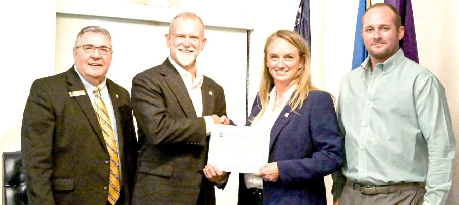 Newly appointed member of the Eastern Oklahoma State College Board of Regents Stephanie Keesee-Pipkin (third from left) was sworn in during the board’s July meeting. Left to right: Dr. Randy Harp, EOSC president; Sen. Warren Hamilton, Keesee-Pipkin and Latt Jeffrey, EOSC Board of Regents chairman.