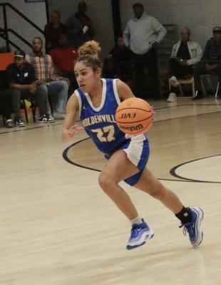Holdenville guard, Blakeli Whiteman, shows a look of determination as she brings the ball up the court in the the Wolverines’ contest at Wewoka.Holdenville will host Atoka Tuesday in their final game before Christmas Break.