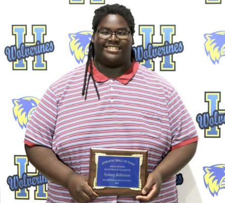 WOLVERINE STATE CHAMPION POWERLIFTER, SYDNEY ROBINSON has been inducted into the Holdenville High School Athletic Hall of Fame. Sydney won his state championship in the heavy weight division at the state powerlifting meet.