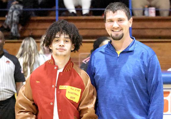 Holdenville All-State basketball player, Kase Sipes, was presented with an All-State Jacket at a recent varsity game. Kase earned All-State Honors during the Wolverines 2024-2025 season
