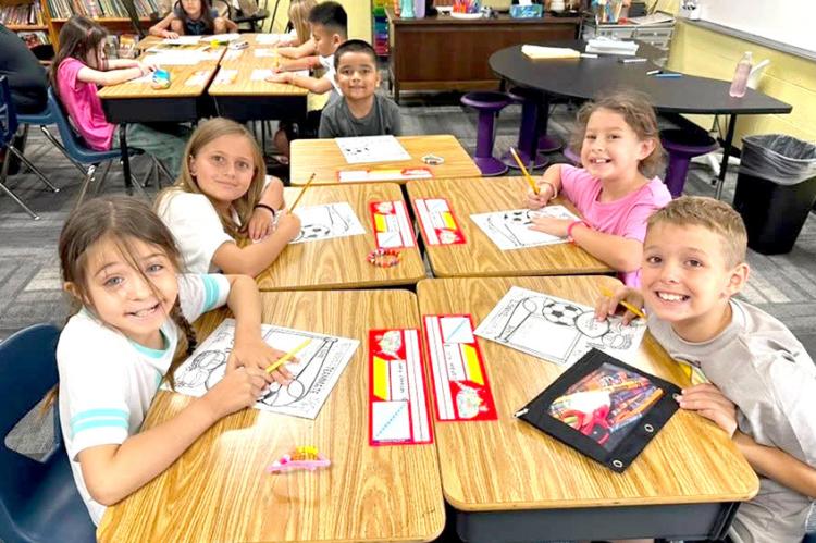 MRS. LASTER’S 3RD GRADE CLASS GEARS UP FOR THEIR FINAL YEAR AT REED...Pictured above are Ivory Johnson, Penny Robinson, Carley Epperson, and Landon Hill.