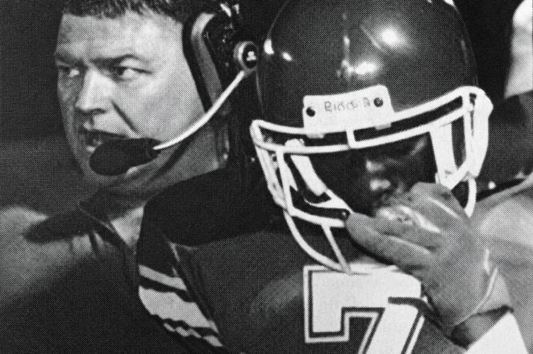 Coach Rawls sends James “Juke” Jones in with the next play during the 1999 State Quarterfinal game.