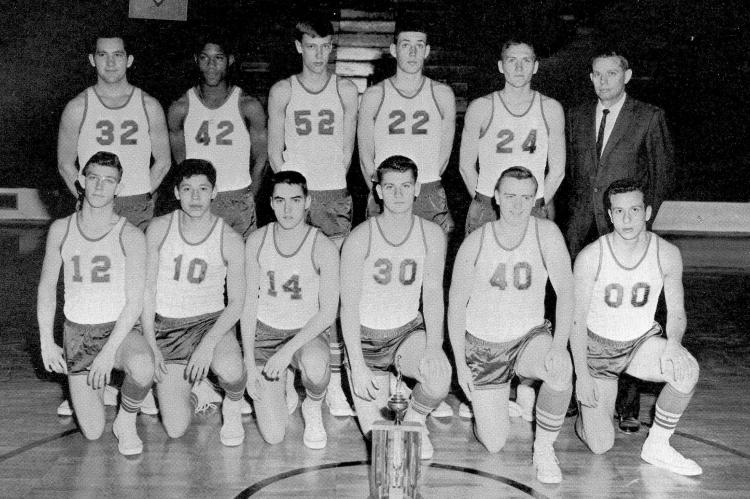 A TEAM - Kneeling: Granville Turner, Leonard Harjo, Darryl Hester, Tom Trow, Errol Douglas and Lyndle Ellis. STANDING: Rick McCoin, Mike Stripling, Phil Davis, Jerry Moeller, Richard Nolen and Coach Charlie Self.