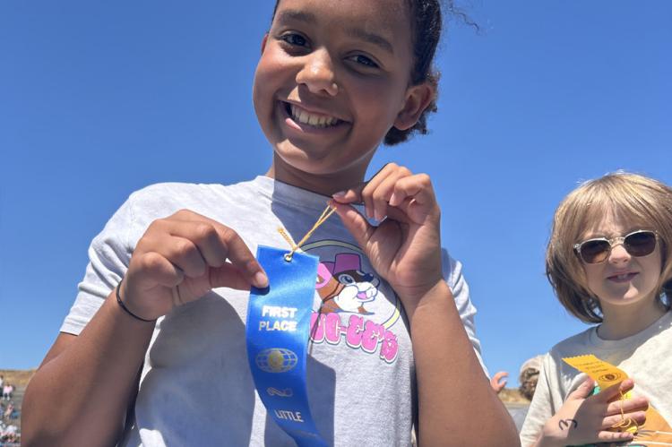 Essie Burdine won a Blue Ribbon at the Little Olympics!