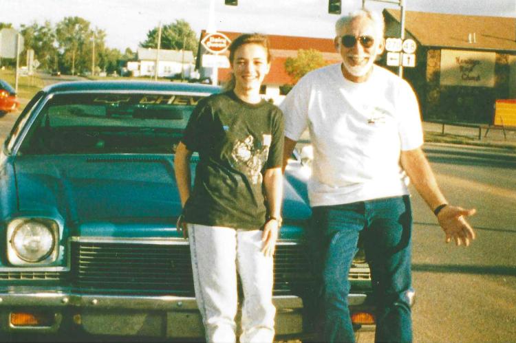 Jack pictured in Oct. 1993 with co-manager and friend Jennifer Bleeker and her first car.