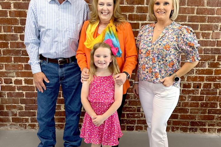 Danny and Nancy Thetford with daughter, Nicole Brown and granddaughter.